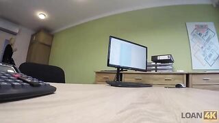 A woman entrepreneur needs money, she is interviewed by a loan agent