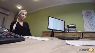 A woman entrepreneur needs money, she is interviewed by a loan agent
