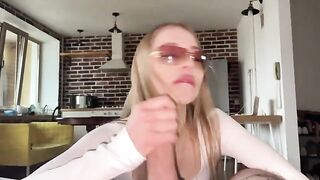 Pretty babe with glasses gets her face covered with sperm after a hard sex session