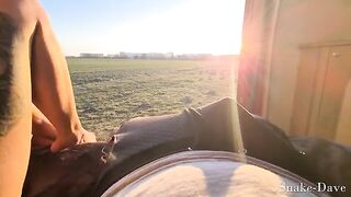 Outdoor sex in the open door of a camper on the road