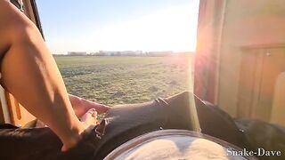 Outdoor sex in the open door of a camper on the road