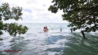 A couple enjoys an amazing and passionate sex session in the blue lagoon