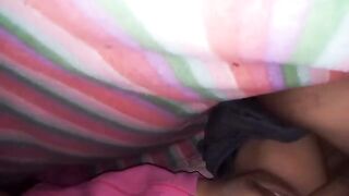 The couple has sex under the sheets with intense passion