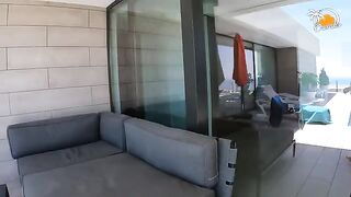 A blonde woman in socks has sex with her boyfriend in the swimming pool