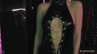 Skinny teen AngelQ strips on stage wearing high heels and lingerie
