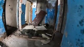 An exhibitionist girl is walking in an abandoned building with her hot girlfriend