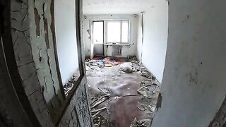 An exhibitionist girl is walking in an abandoned building with her hot girlfriend
