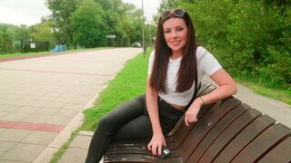 A risky blowjob in the park with a hot brunette babe!