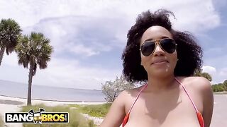 The girl, Julie Kay, is doing sports outdoors with her amazing body