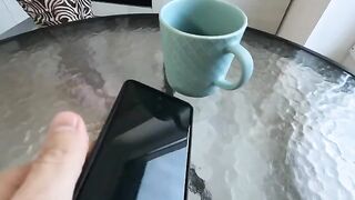 The stepson is having fun with his sexy stepmom in the kitchen