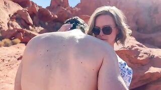 A sexy woman fucks with her friend in front of her husband in the desert