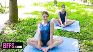 Young gymnast Katie Kush is stretching with her coach Kenzie Madison in a taboo scene