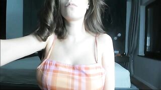 A pregnant girl plays with her big belly and huge boobs in a steamy solo session