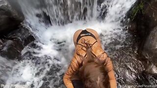 Passionate sex of amateur couple by the waterfall to celebrate a milestone
