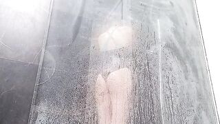 A woman has a wet sex in the shower and brings herself to squirting orgasm