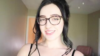 A girl is reading a funny book and she's not allowed to cum