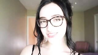 A girl is reading a funny book and she's not allowed to cum