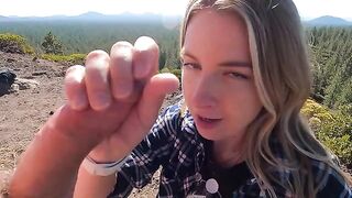 Blonde makes a blowjob on the top of the mountain, risking to get caught