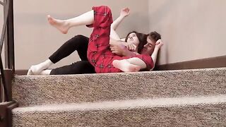 A hot step sister is teasing her brother, leading to sex on the stairs