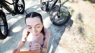 Petite brunette gives a blowjob to her tourist friend