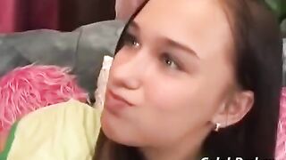 A young girl has sex with her adult friend on the couch