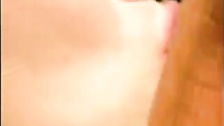 A man has sex with his girlfriend near the pool and cums on her face