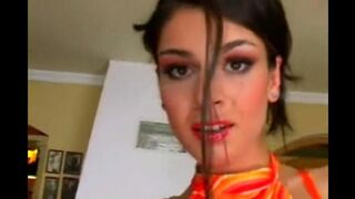 Beauty wearing leather underwear masturbates on the chair