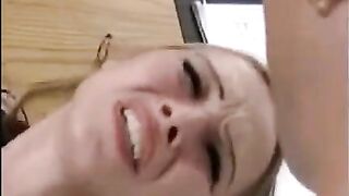 A girl is being fucked by a hand and dick at once