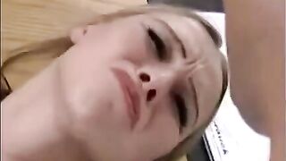 A girl is being fucked by a hand and dick at once