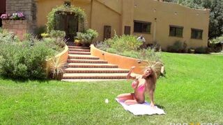 A blonde has sex with her lover on the lawn in a steamy scene