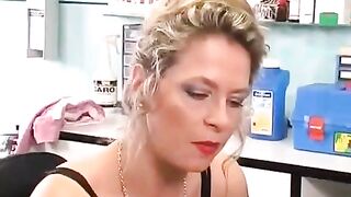 Girl plays with her clit piercing using a toy