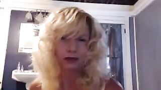 A mature woman plays with herself in the bathroom, feeling good
