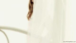 A pretty young woman plays with herself and reaches climax