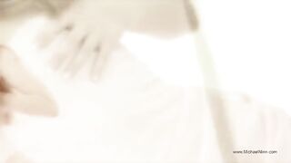 A pretty young woman plays with herself and reaches climax