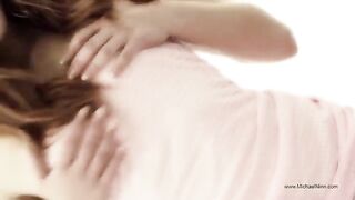 A pretty young woman plays with herself and reaches climax