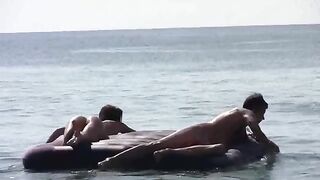 Nude beauties have fun on the beach