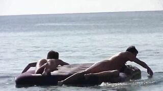 Nude beauties have fun on the beach