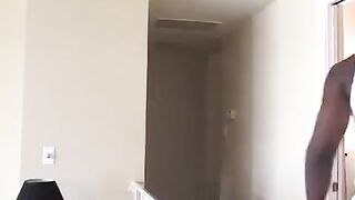 Blonde woman penetrated by a large black member in her ass on the couch