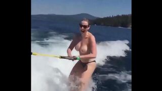 Topless girl skiing on water, it's a first time