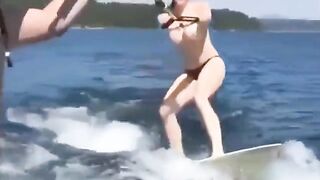 Topless girl skiing on water, it's a first time