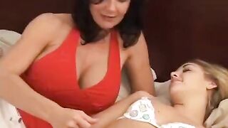 Young and old lesbians are having fun with a strap-on dildo