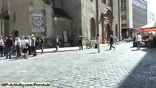 A girl showed her cunt to all the people on the street