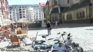 A girl showed her cunt to all the people on the street