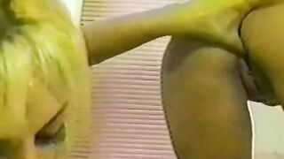 Girls have fun with each other in the shower using toy play