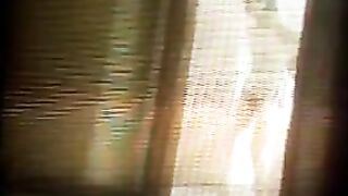 A hidden camera secretly captures a private moment in the fitness club