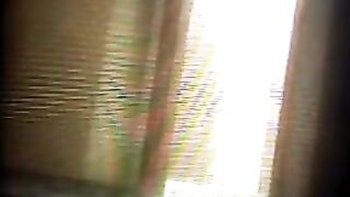 A hidden camera secretly captures a private moment in the fitness club