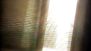 A hidden camera secretly captures a private moment in the fitness club