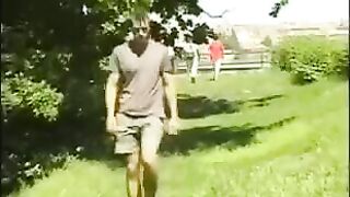 A guy caresses his huge cock in the hayloft, mimicking a public act