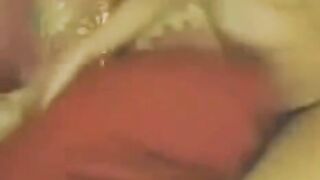 A Chinese girl masturbates in front of her webcam, showcasing her sensual solo performance