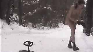 Naked beauties have fun with snowballs on the street